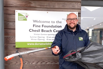 Marc Kativu-Smith going on a beach clean at Chesil by Dan Bartlett 