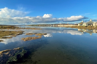 A photo of the Wild Chesil Centre taken looking across the water