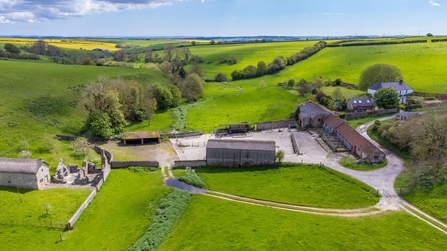 Lyscombe river valley and chapel with farm buildings and views across to Dorchester